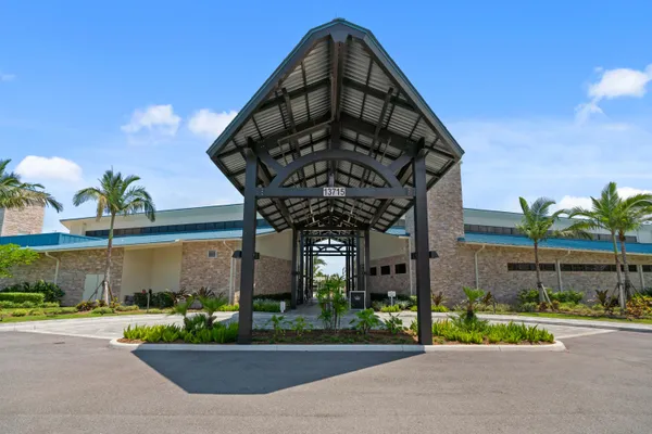 a view of a park with large trees