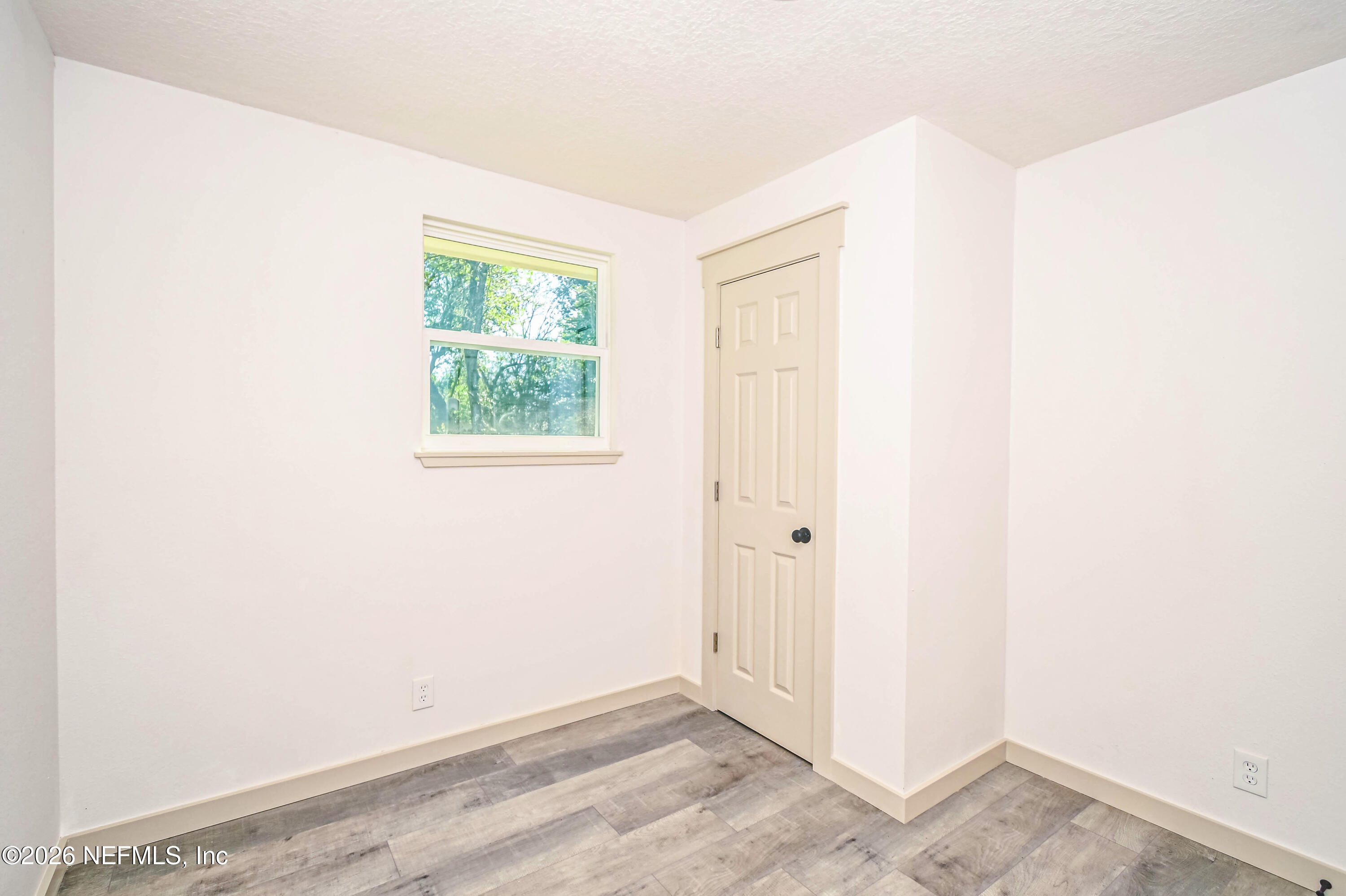 406 Barbara Circle Macclenny, FL 32063 - Photo 12 of 31 a view of a room that has a window in it
