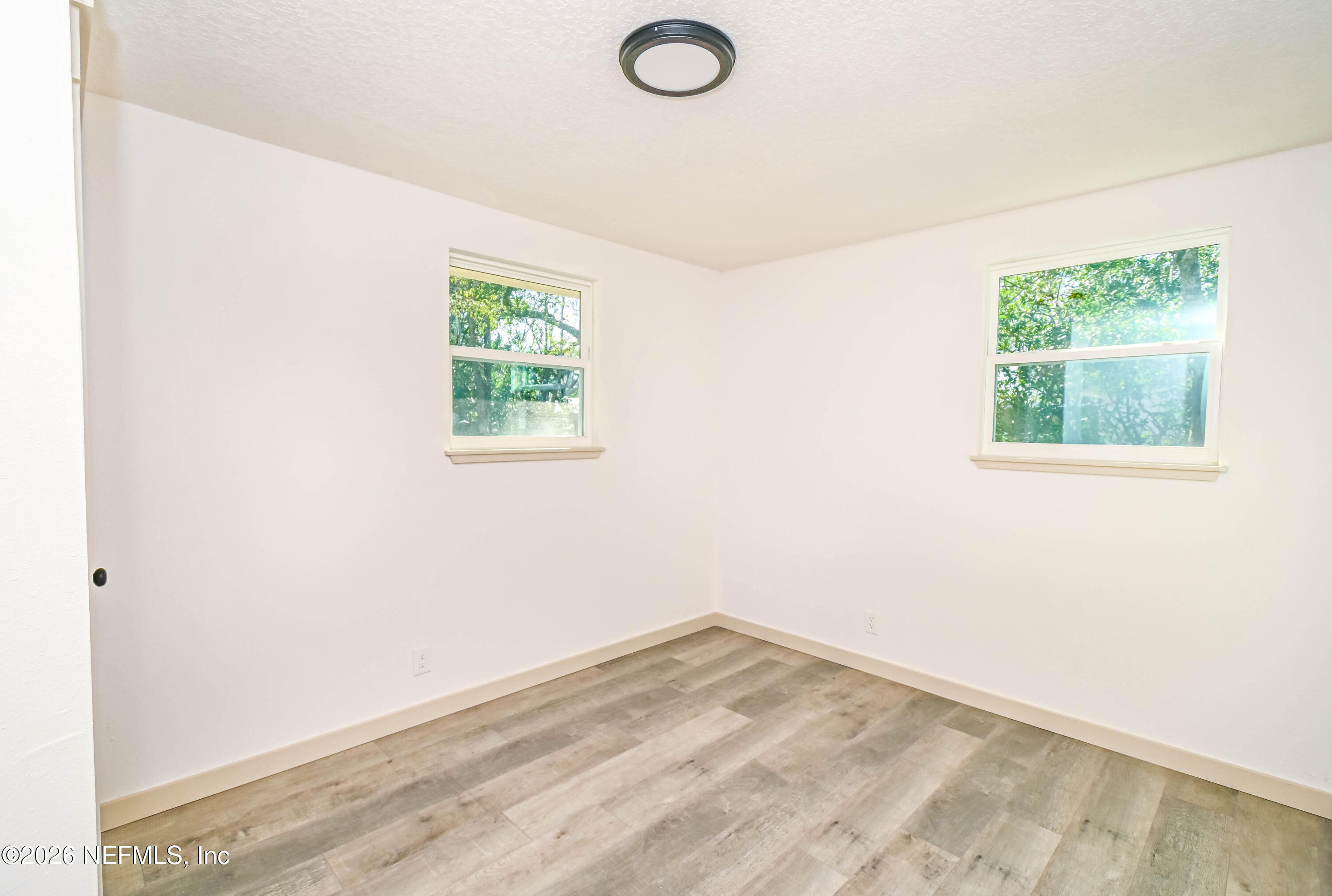 406 Barbara Circle Macclenny, FL 32063 - Photo 15 of 31 an empty room with a window