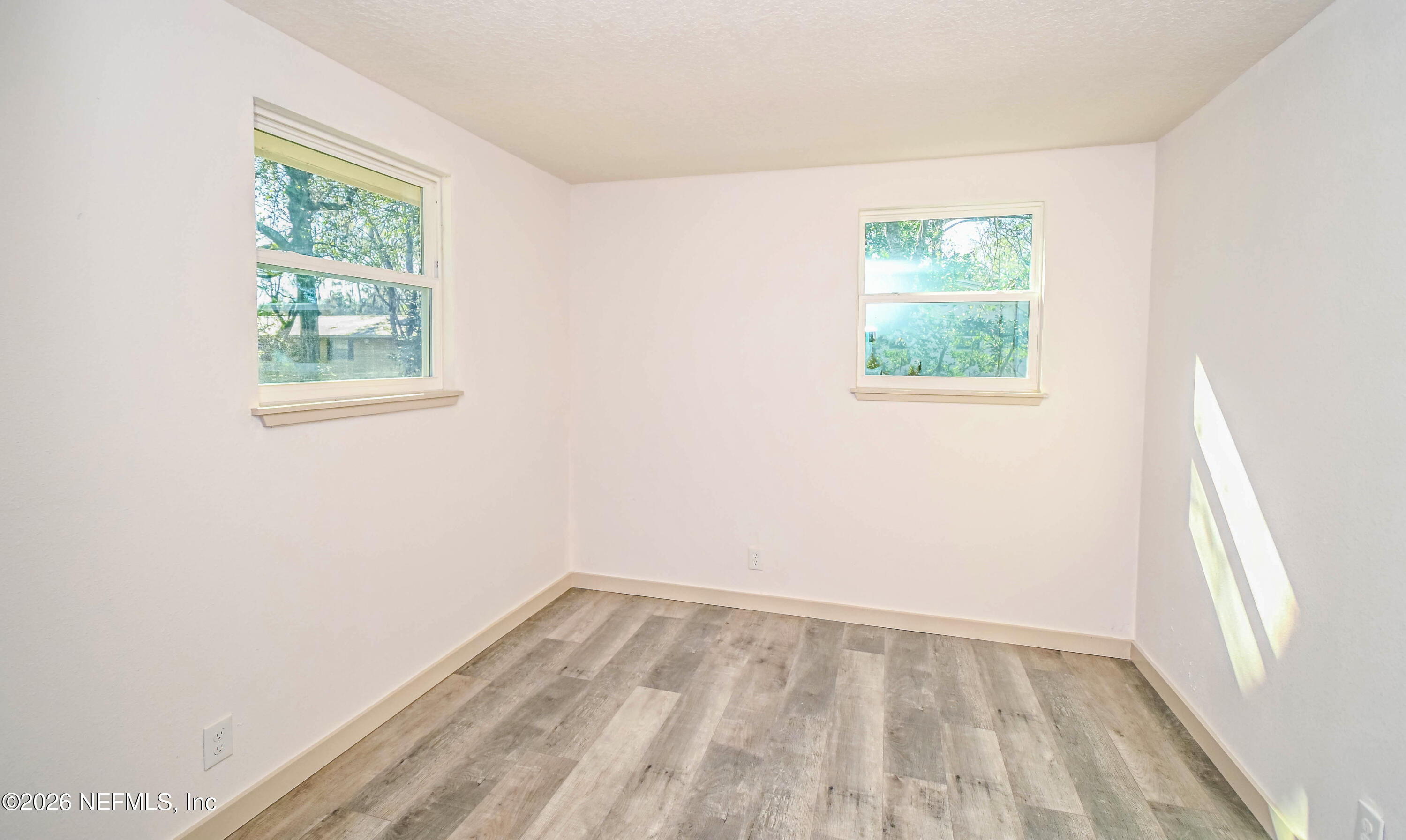 406 Barbara Circle Macclenny, FL 32063 - Photo 16 of 31 an empty room with a window