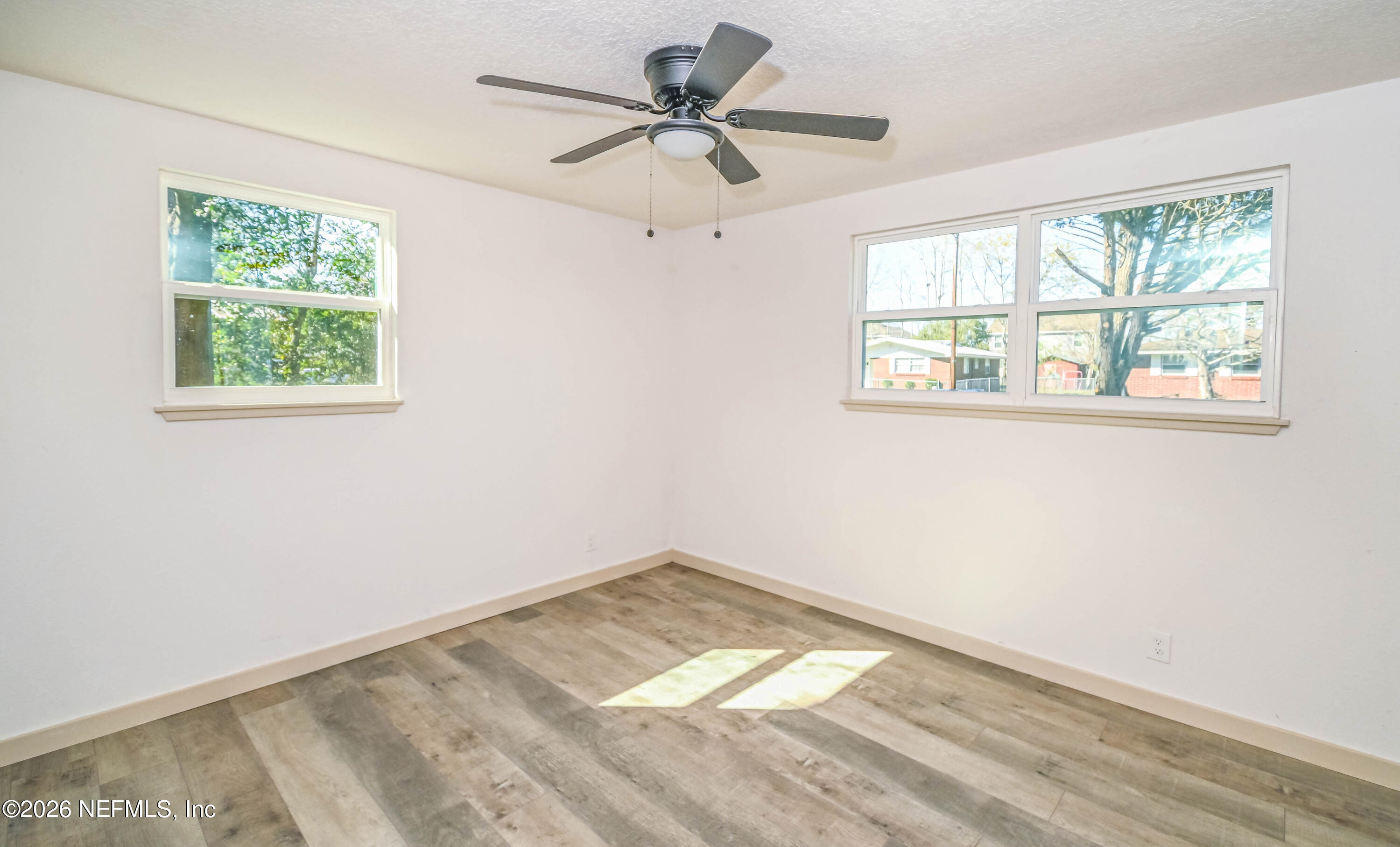 406 Barbara Circle Macclenny, FL 32063 - Photo 20 of 31 a view of a room with a window and a ceiling fan