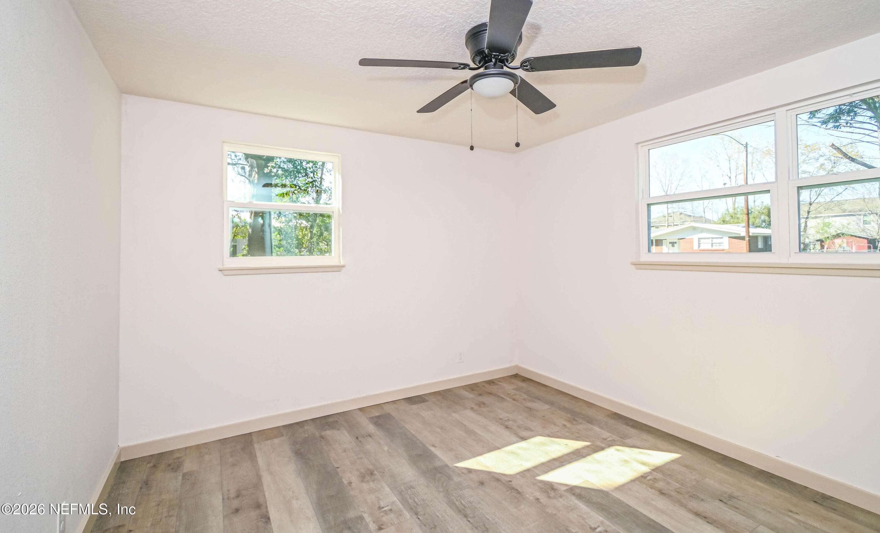 406 Barbara Circle Macclenny, FL 32063 - Photo 24 of 31 an empty room with a window