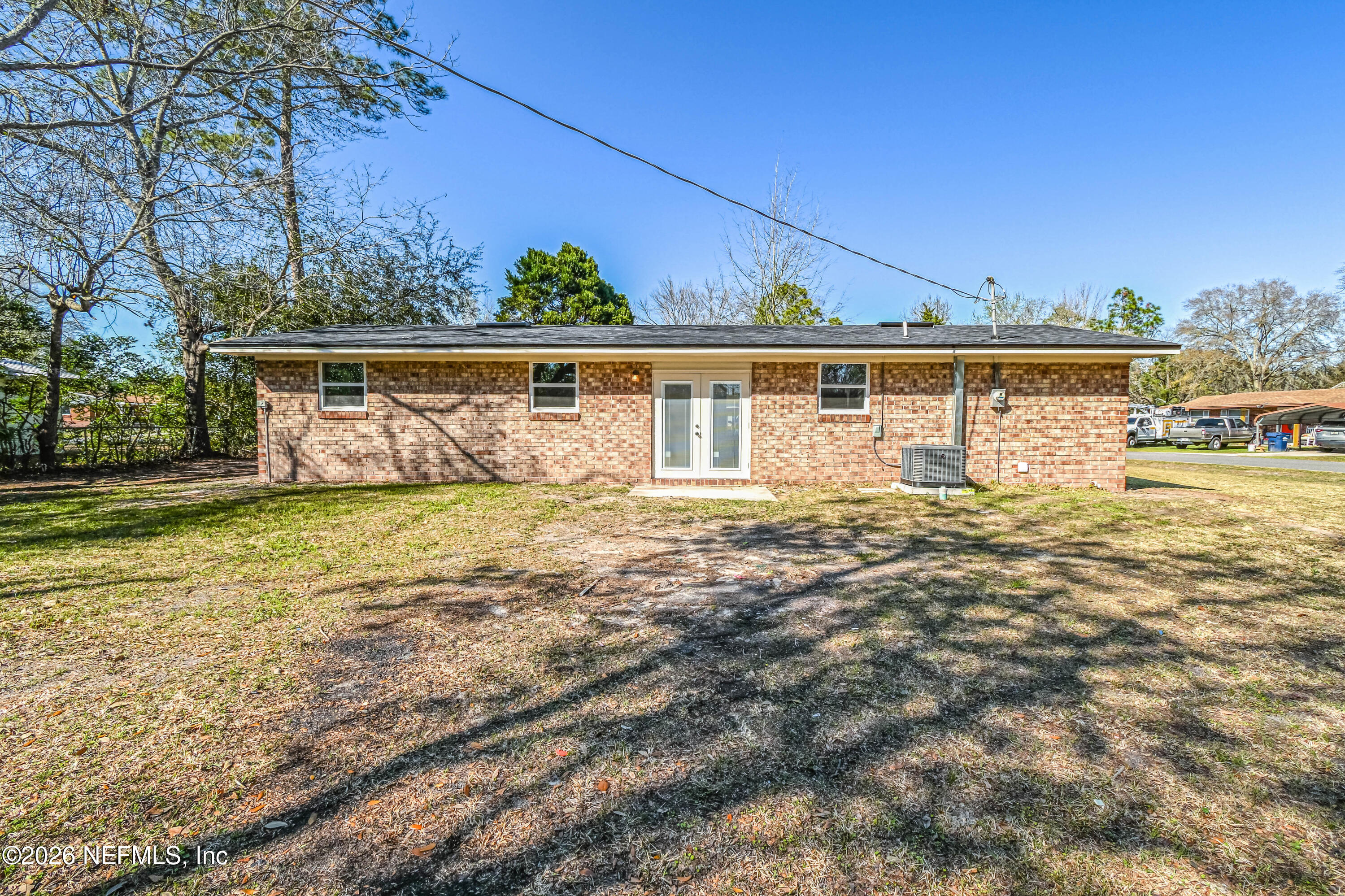 406 Barbara Circle Macclenny, FL 32063 - Photo 28 of 31 a front view of a house with garden