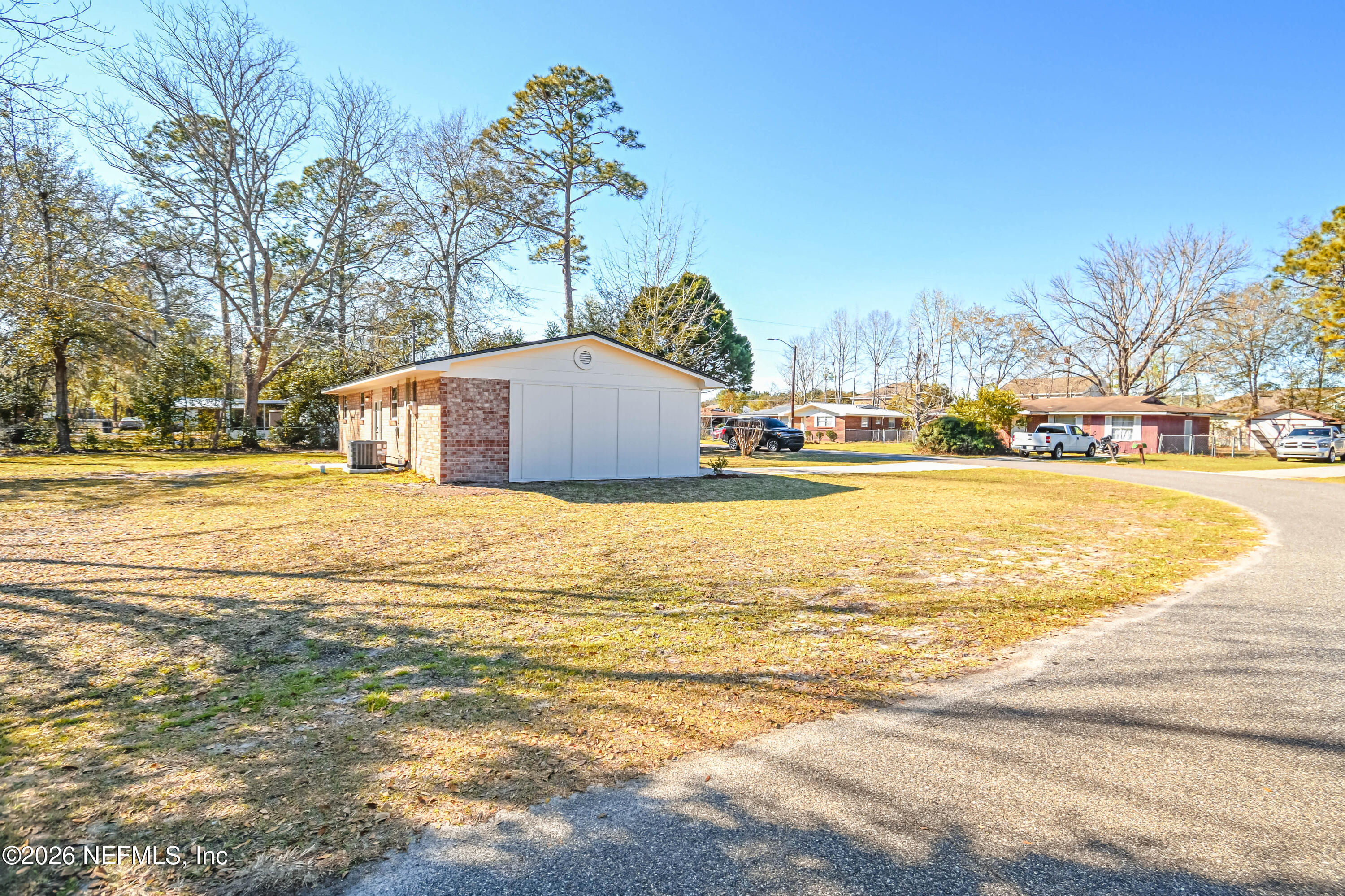 406 Barbara Circle Macclenny, FL 32063 - Photo 31 of 31 a view of a house with a swimming pool
