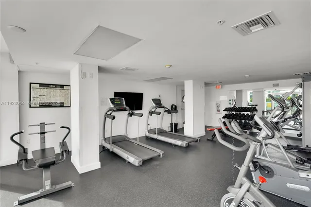 a view of a room with gym equipment