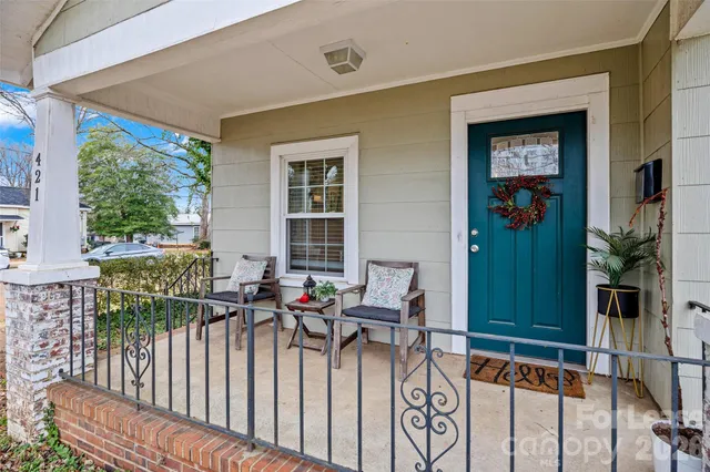 a view of balcony with furniture