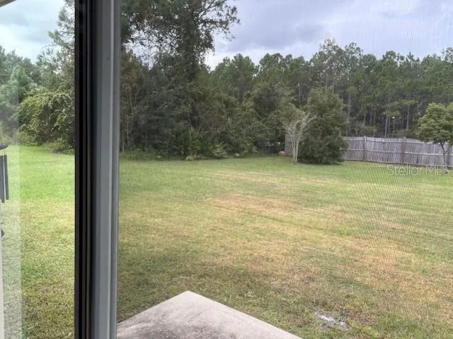 a bathroom with a granite countertop sink a toilet and bathtub