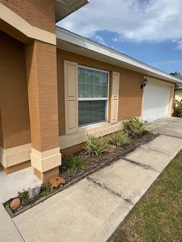 view of a house with a yard