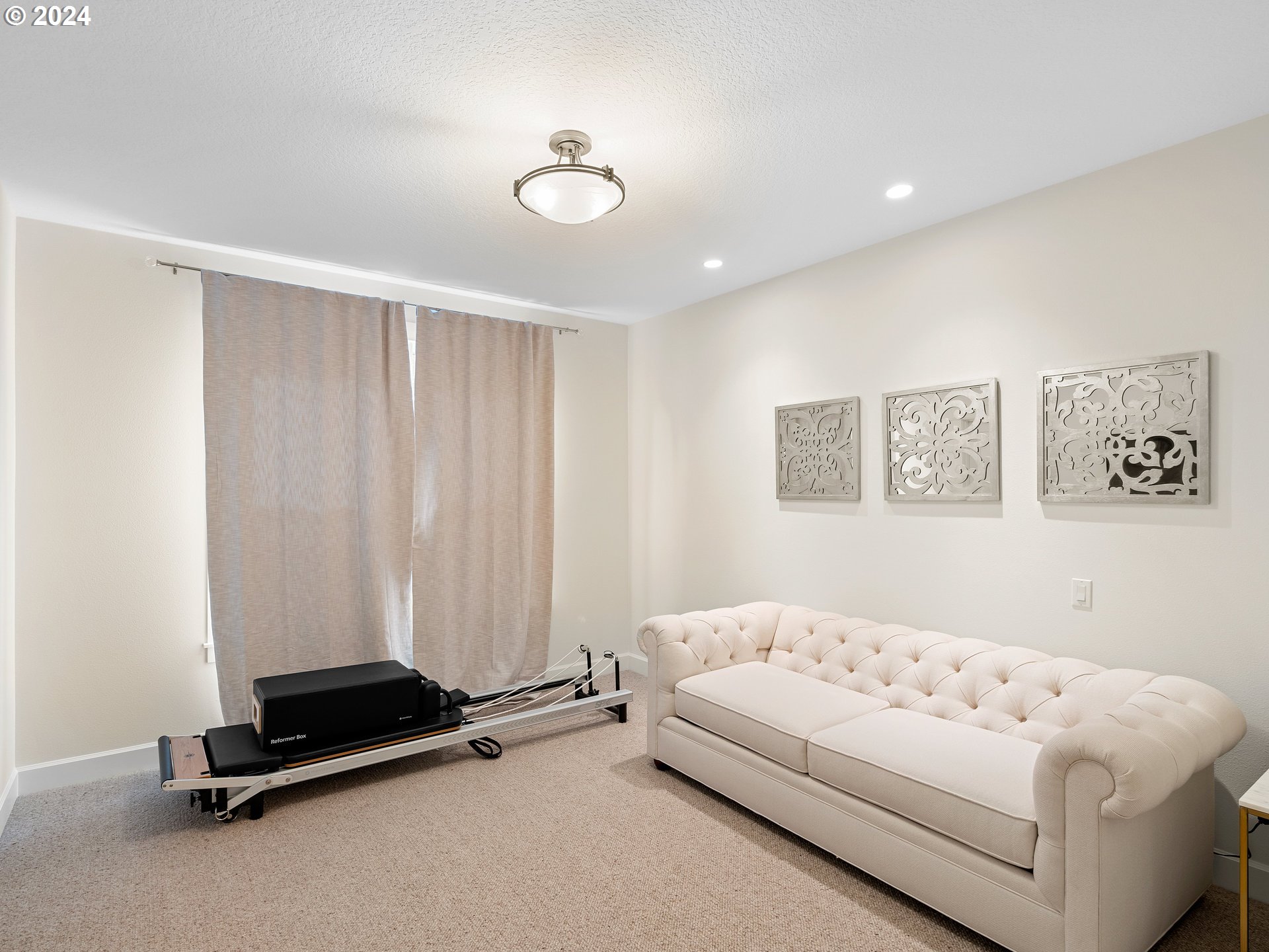 9010 Southwest Inez Street Tigard, OR 97224 - Photo 21 of 42 a bedroom with a bed and a couch