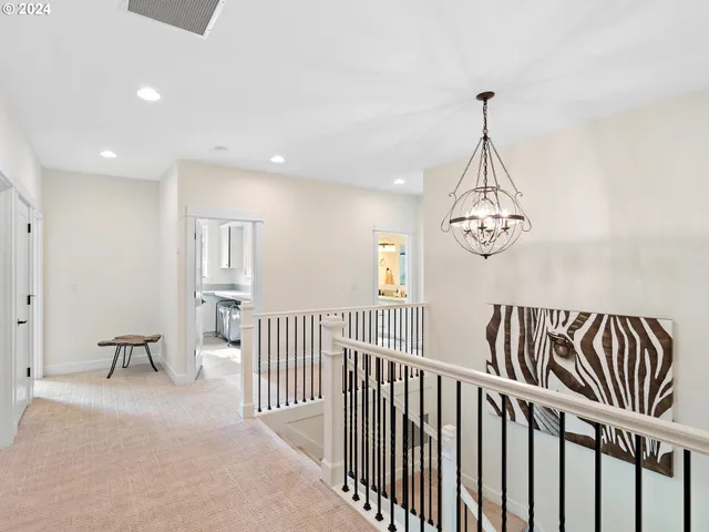 a view of a hallway with windows