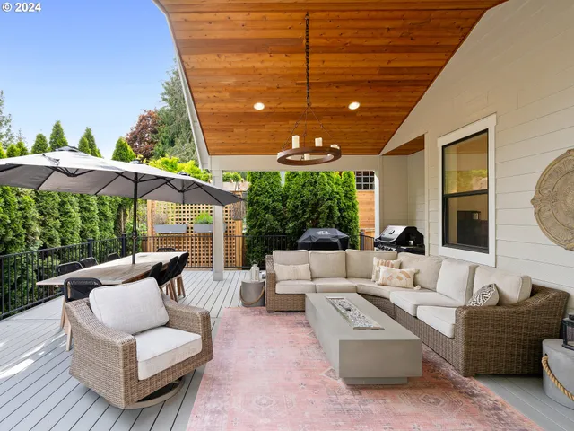 a outdoor living space with furniture and garden view