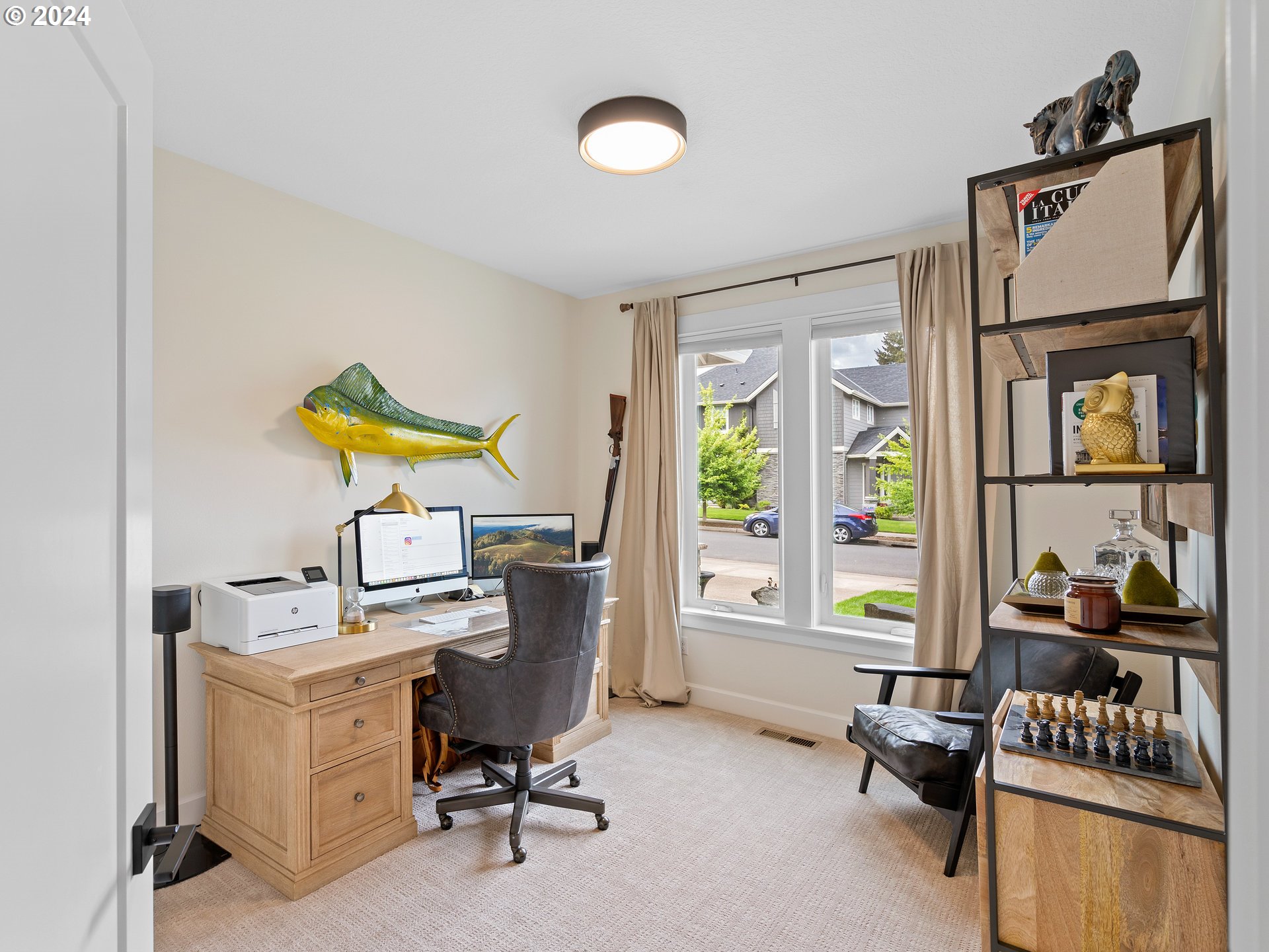 9010 Southwest Inez Street Tigard, OR 97224 - Photo 8 of 42 a view of a workspace with furniture and a window