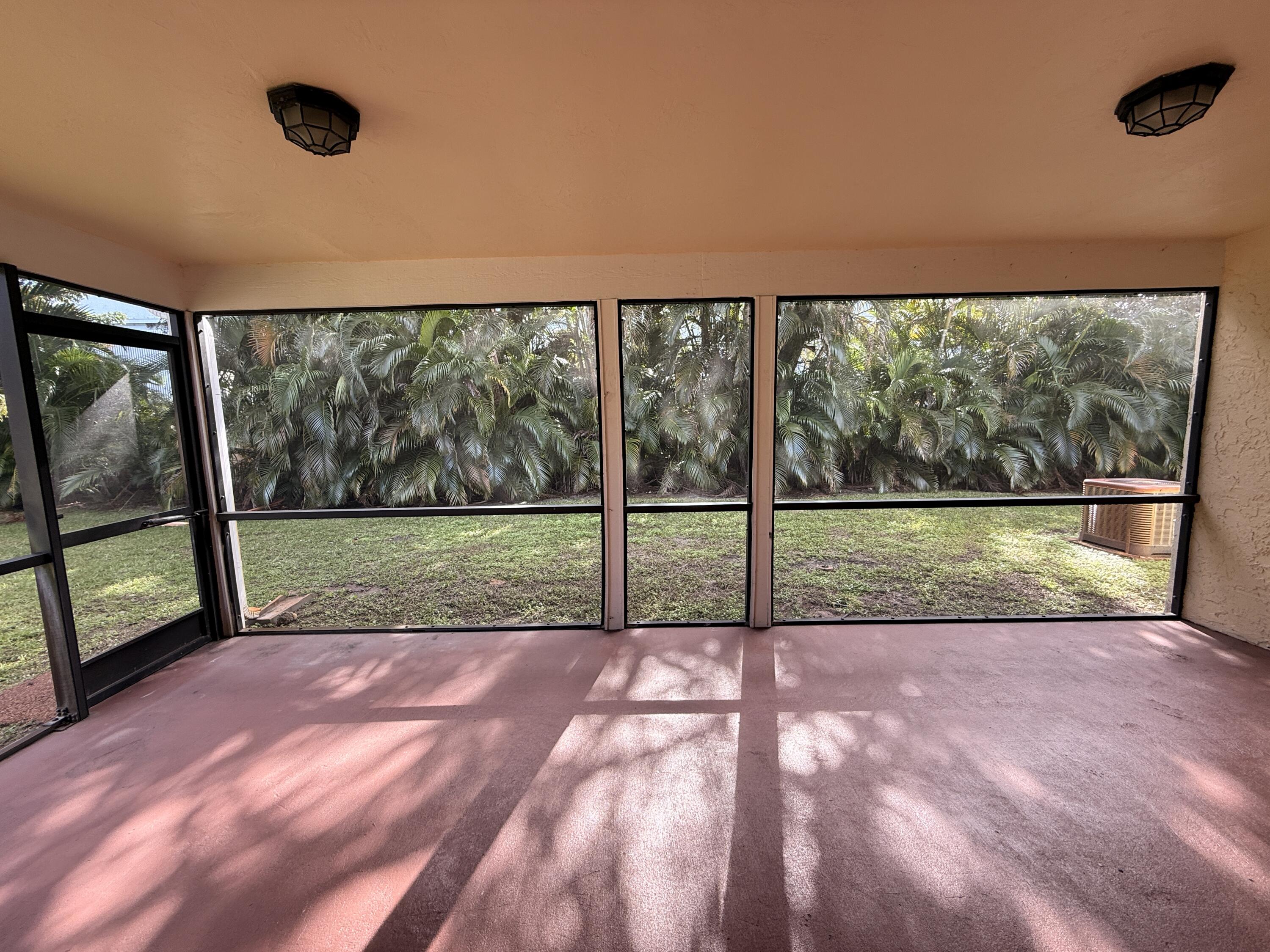450 Northeast 42nd Street Boca Raton, FL 33431 - Photo 20 of 25 Screened Covered Porch