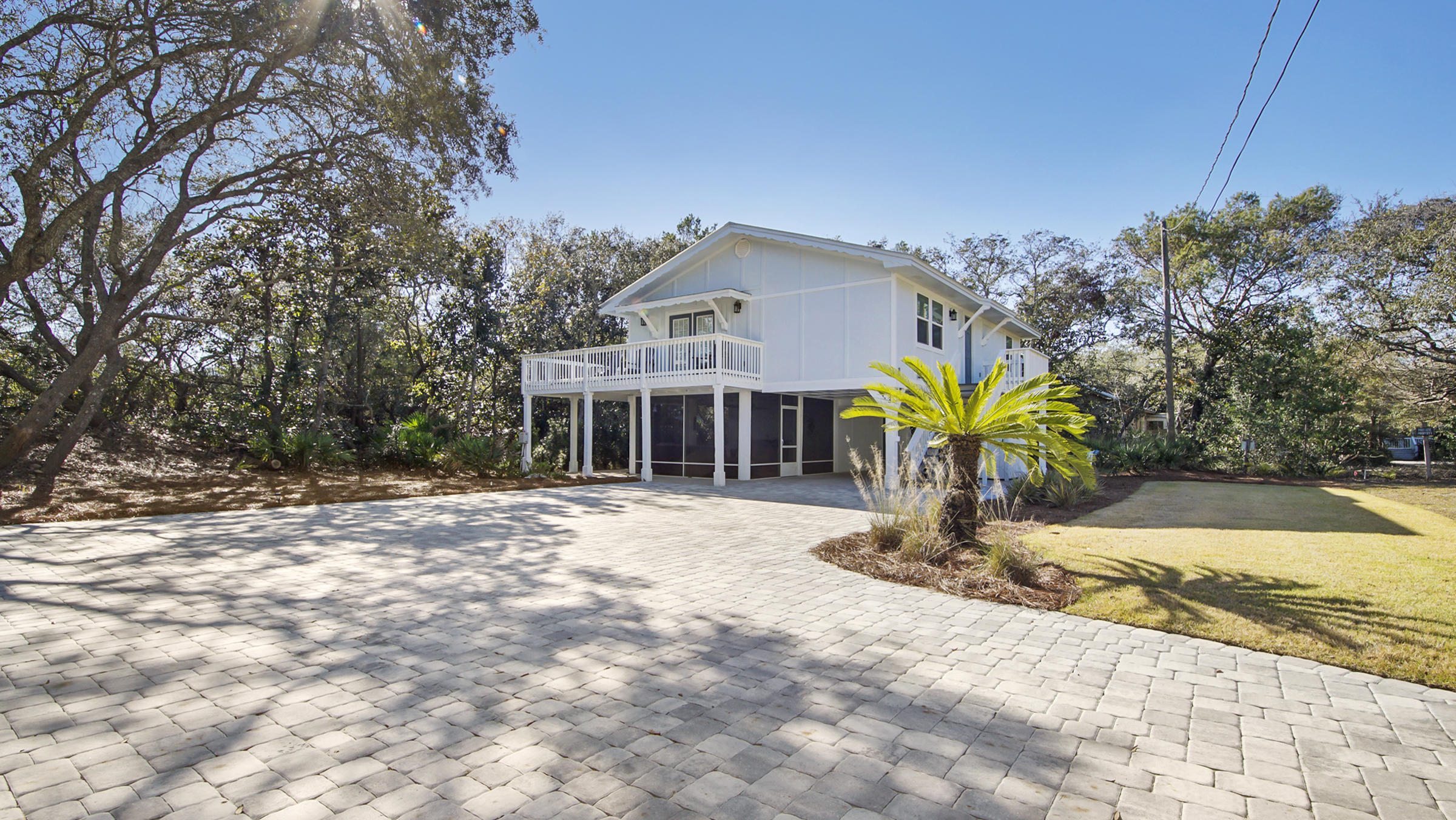 3 Dalton Drive Santa Rosa Beach, FL 32459 - Photo 32 of 33 a front view of a house with a yard