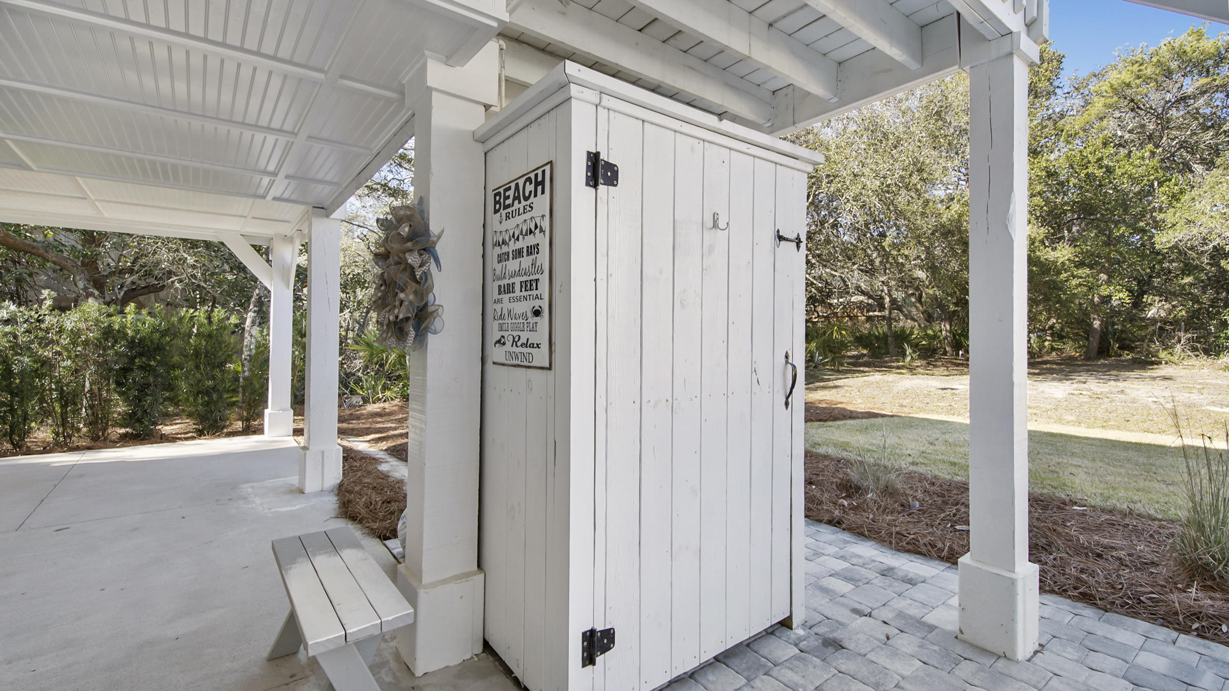 3 Dalton Drive Santa Rosa Beach, FL 32459 - Photo 7 of 33 a view of a porch with a table and chairs