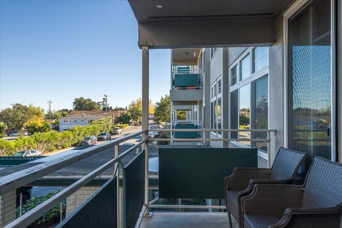 222 Laurel Street, Unit 101 San Carlos, CA 94070 - Photo 26 of 36 a view of a chairs and table in balcony