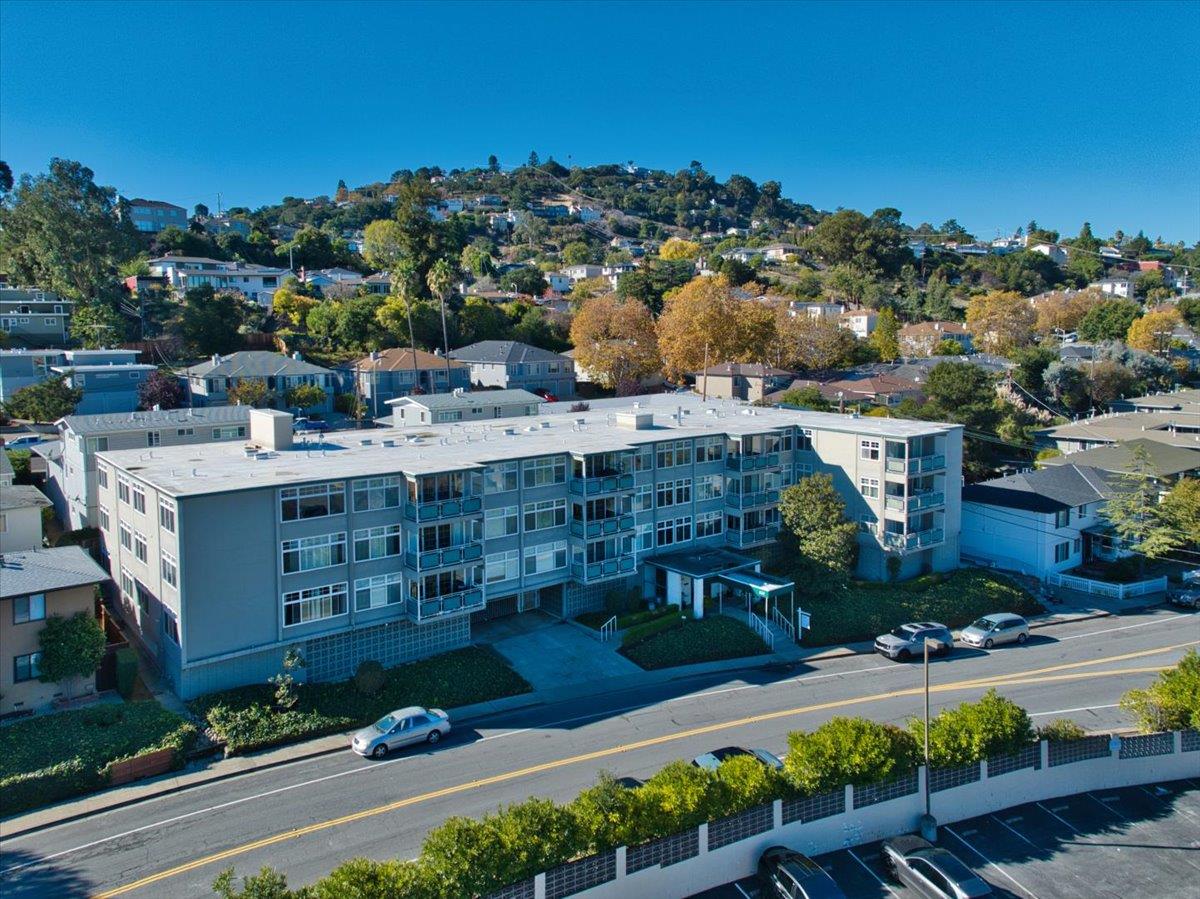 222 Laurel Street, Unit 101 San Carlos, CA 94070 - Photo 35 of 36 an aerial view of a house with a yard and lake view
