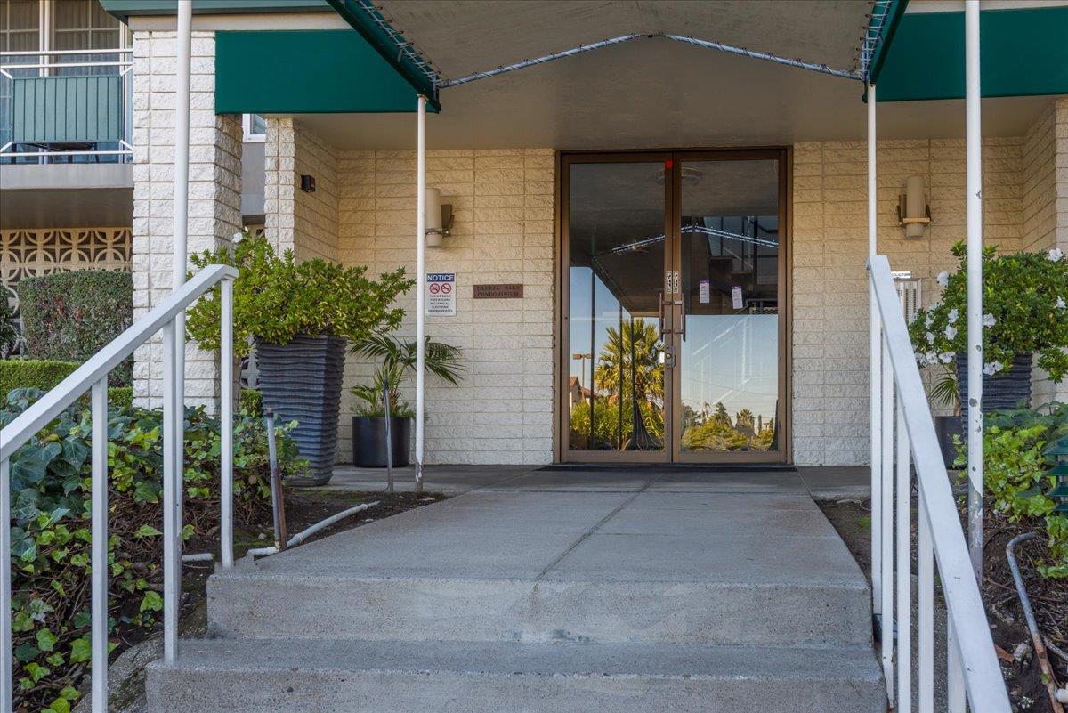 222 Laurel Street, Unit 101 San Carlos, CA 94070 - Photo 4 of 36 a view of front door and potted plants