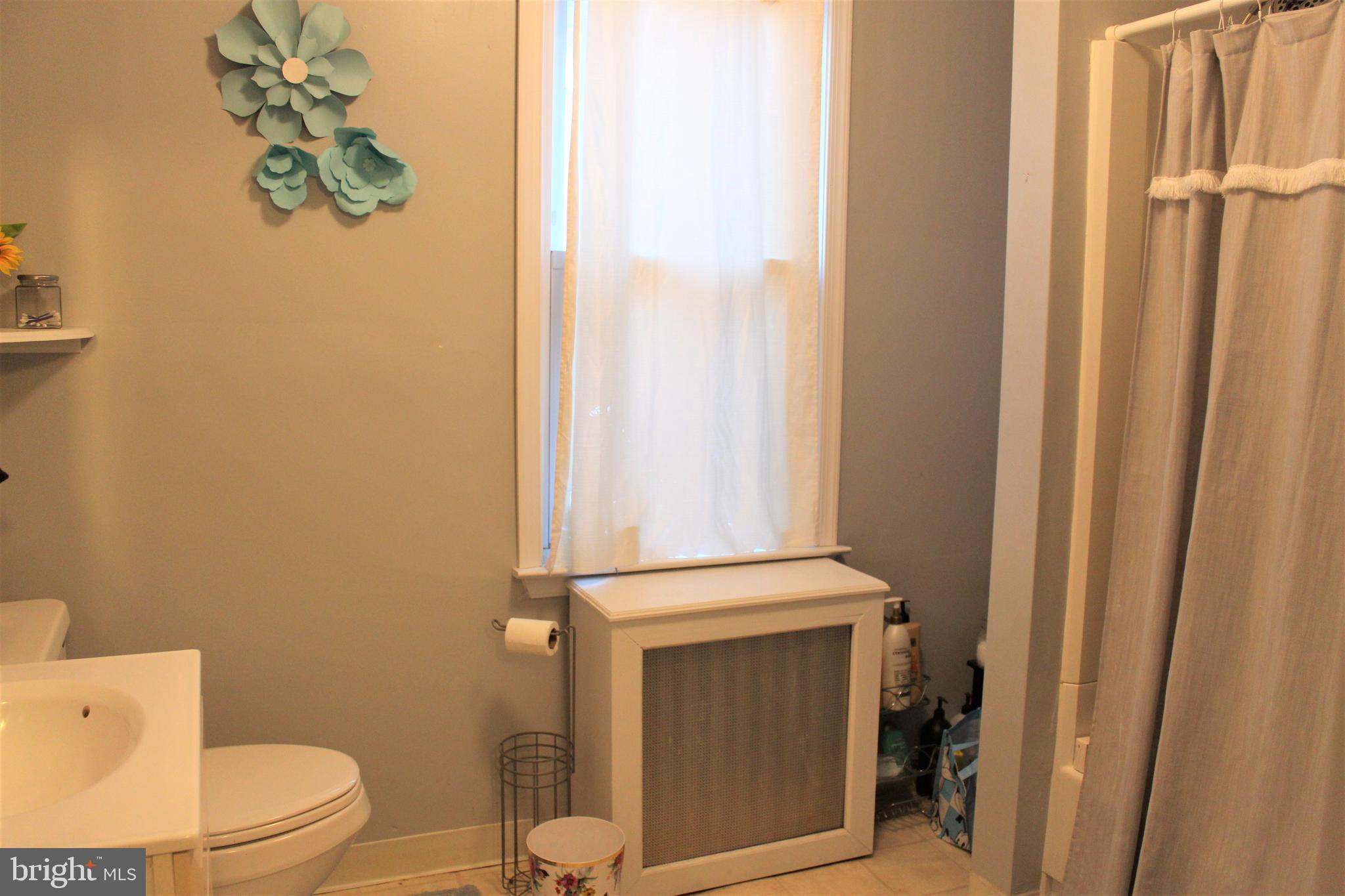 319 Swarthmore Road Glassboro, NJ 08028 - Photo 13 of 16 a bathroom with a toilet and a shower