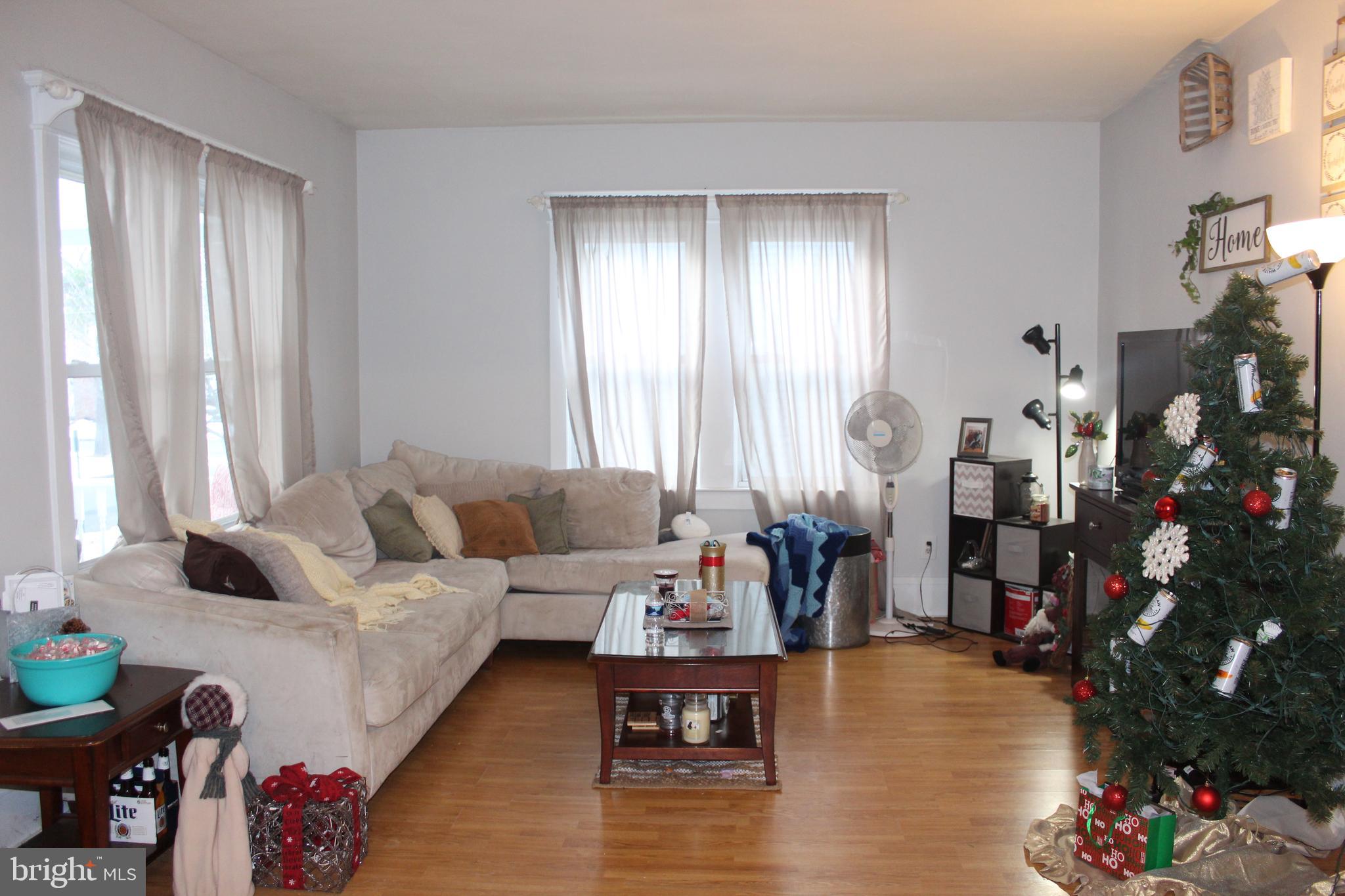 319 Swarthmore Road Glassboro, NJ 08028 - Photo 5 of 16 a living room with furniture and a large window