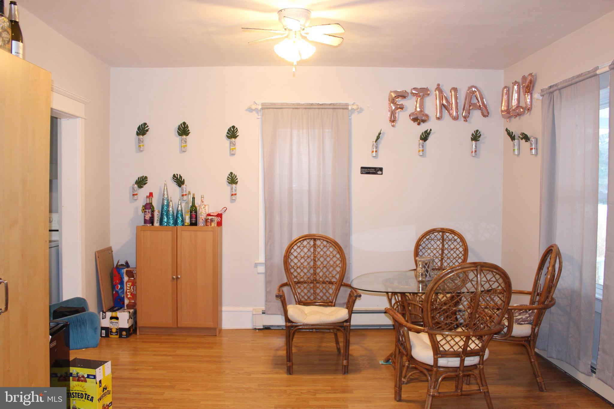 319 Swarthmore Road Glassboro, NJ 08028 - Photo 6 of 16 a view of a workspace with furniture and wooden floor