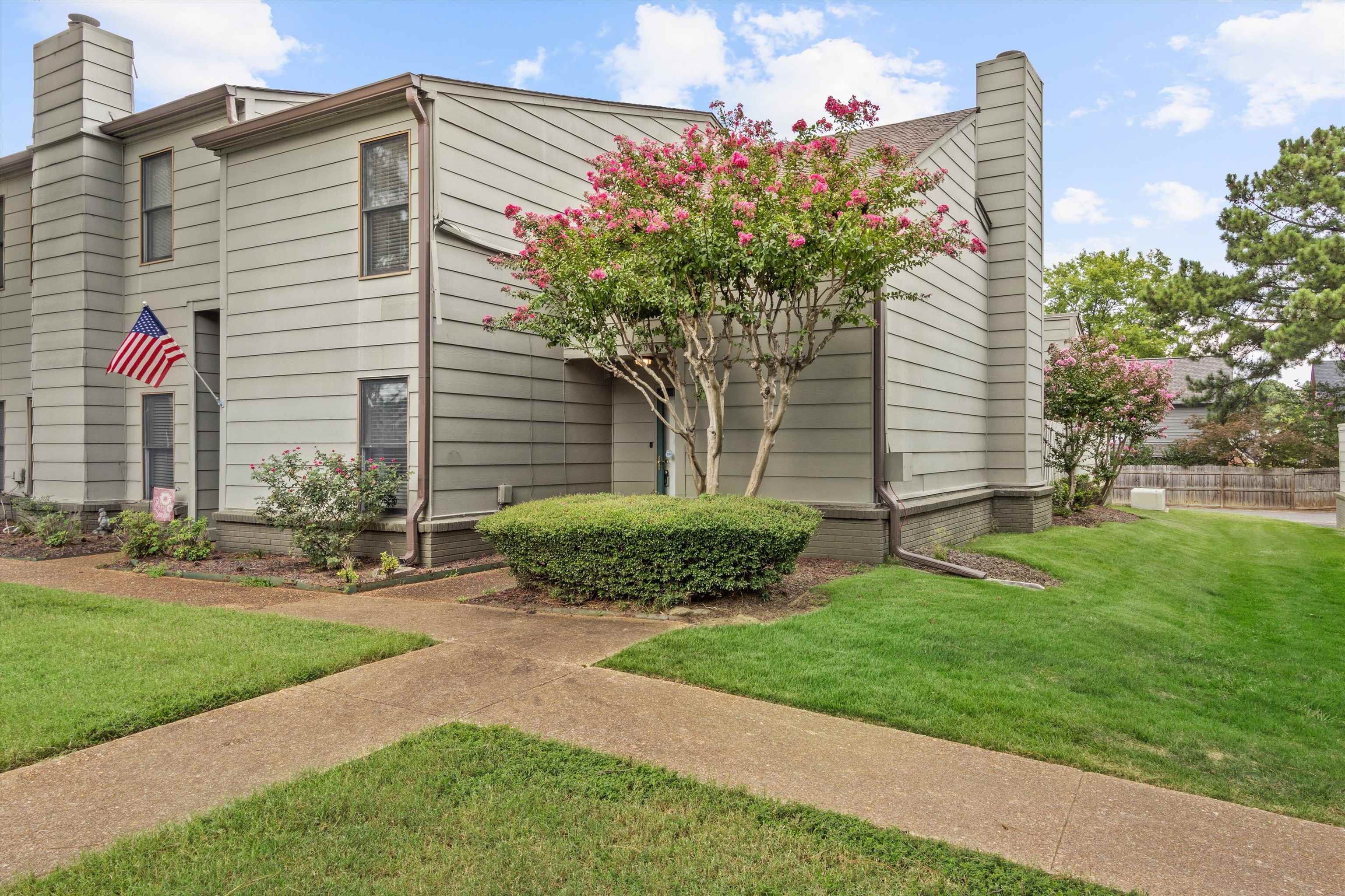 1906 Allenby Road, Unit 16 Germantown, TN 38139 - Photo 2 of 31 Gray siding exterior with multiple windows