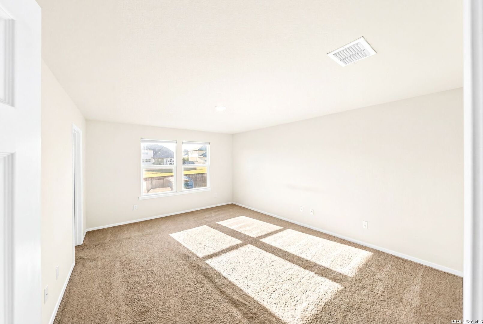 6710 Turnpike Converse, TX 78109 - Photo 12 of 34 an empty room with windows