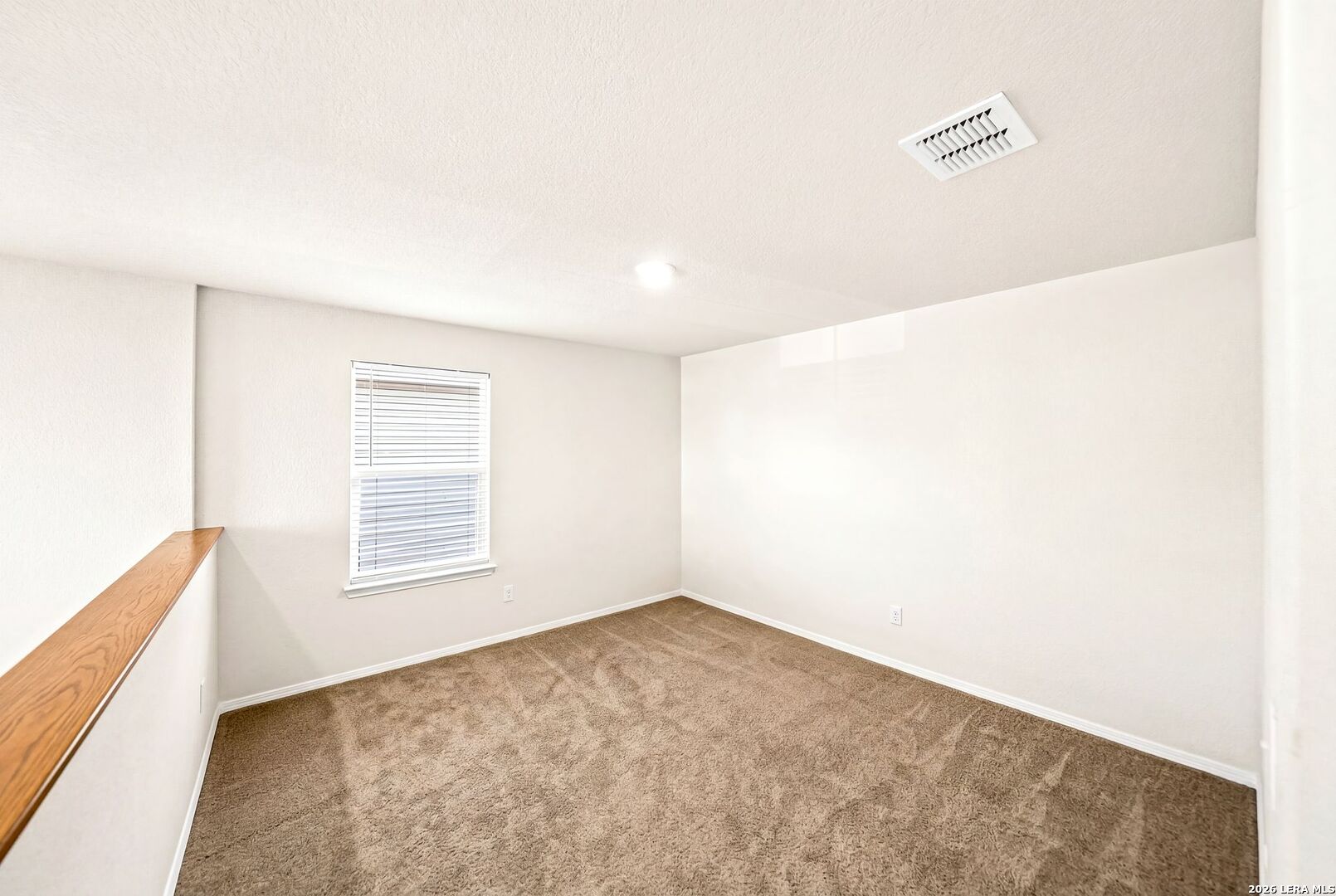 6710 Turnpike Converse, TX 78109 - Photo 21 of 34 an empty room with windows