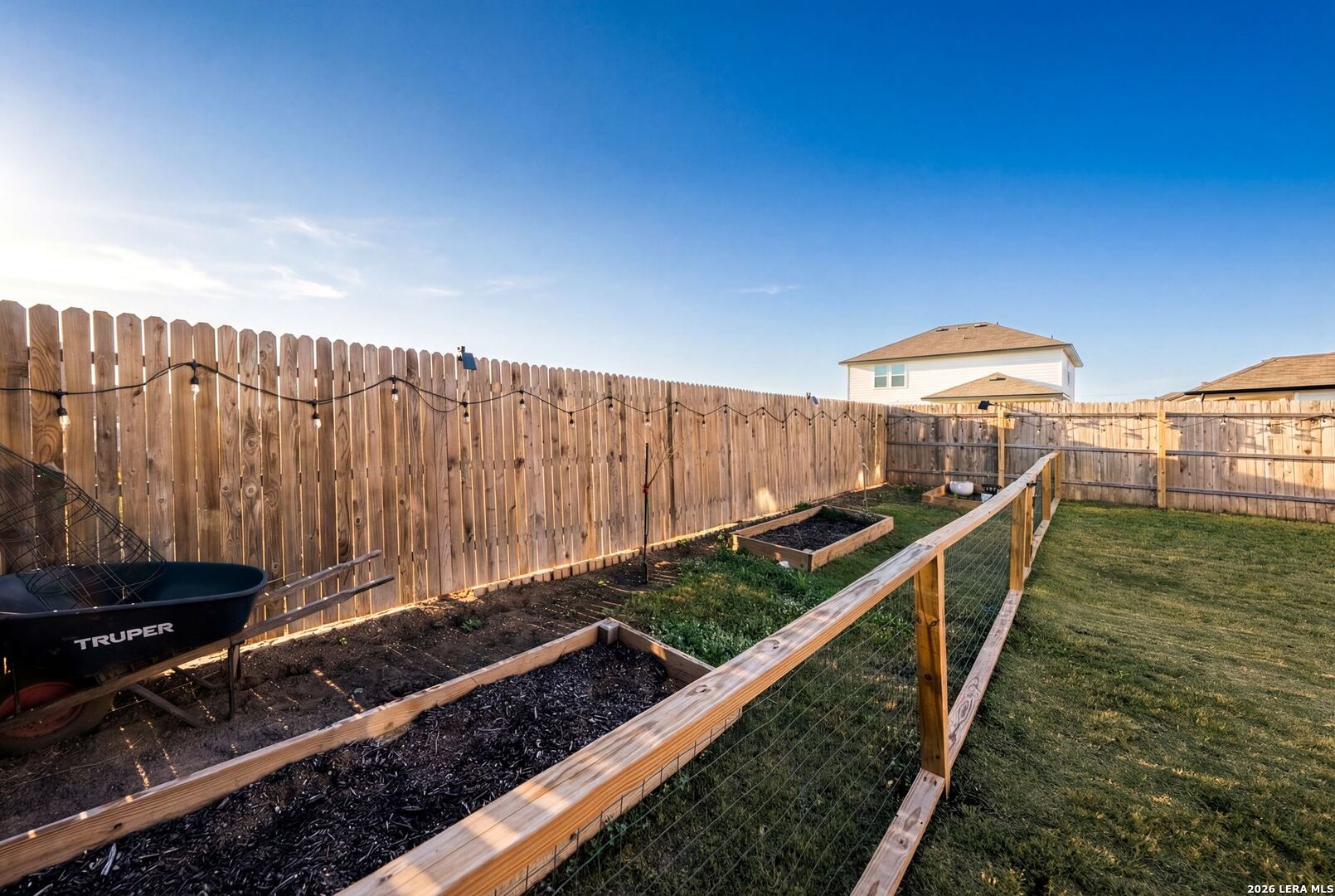 6710 Turnpike Converse, TX 78109 - Photo 27 of 34 a view of a backyard with wooden fence