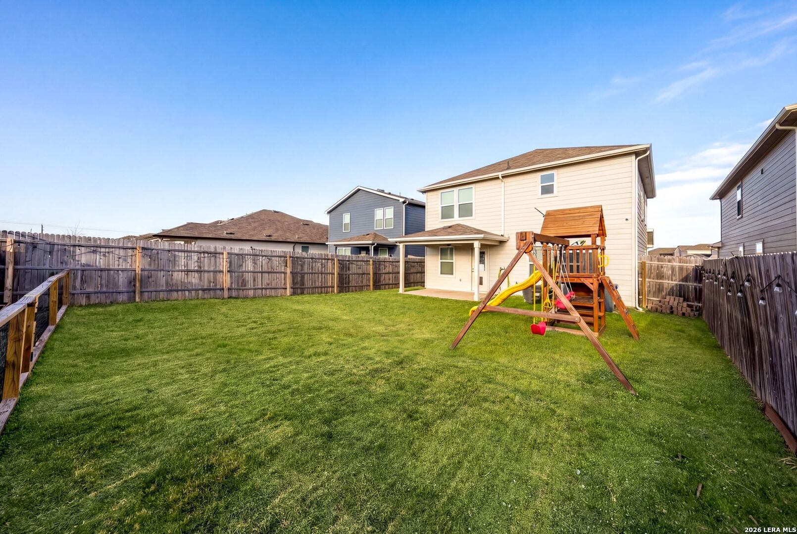 6710 Turnpike Converse, TX 78109 - Photo 29 of 34 a view of a house with a big yard and potted plants