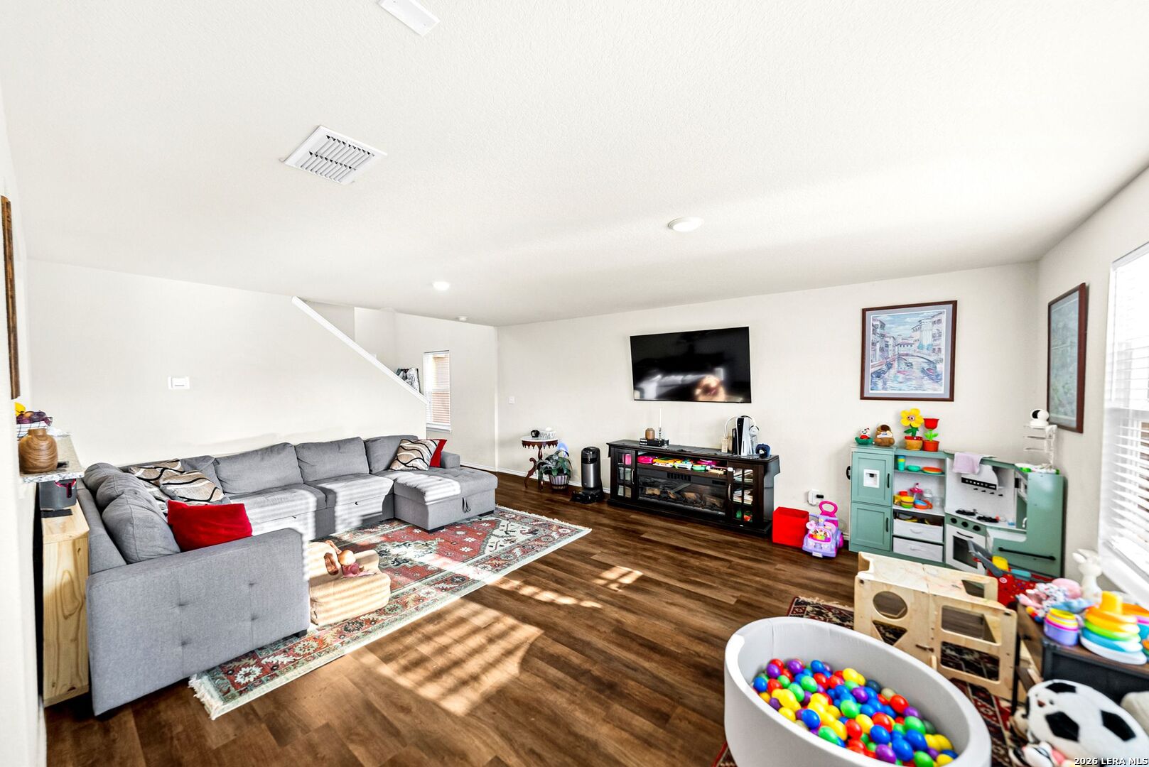 6710 Turnpike Converse, TX 78109 - Photo 30 of 34 a living room with furniture and a flat screen tv