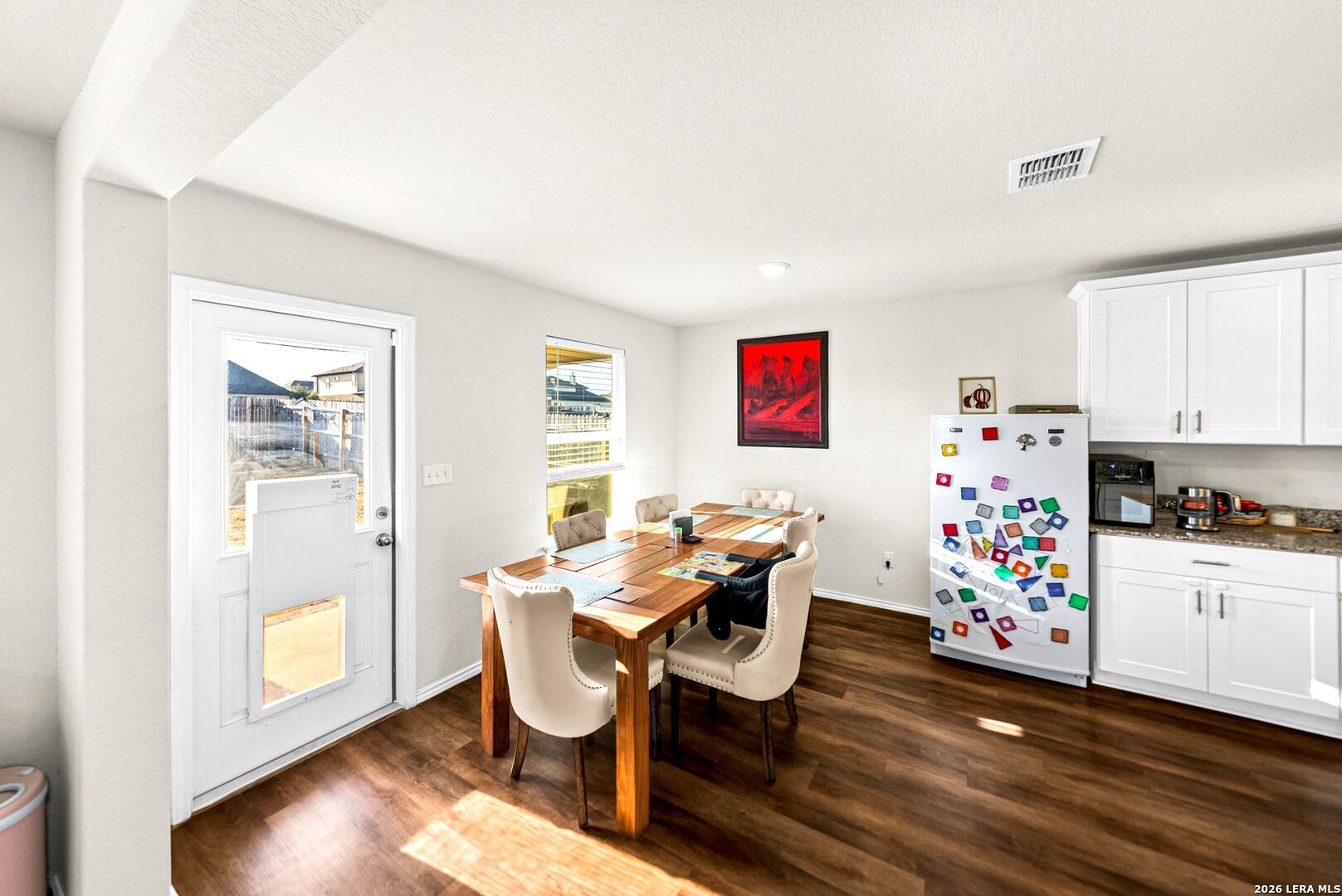 6710 Turnpike Converse, TX 78109 - Photo 7 of 34 a living room with furniture and a table with wooden floor