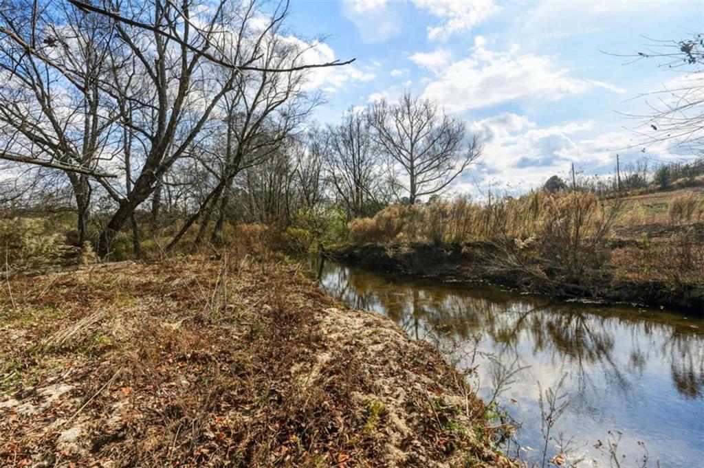 0 Patrick Mill Road Southwest Winder, GA 30680 - Photo 12 of 16 a view of lake with green space