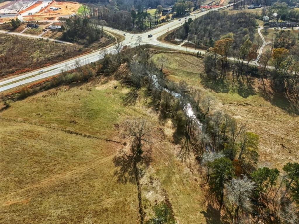 0 Patrick Mill Road Southwest Winder, GA 30680 - Photo 10 of 16 a view of residential houses with road