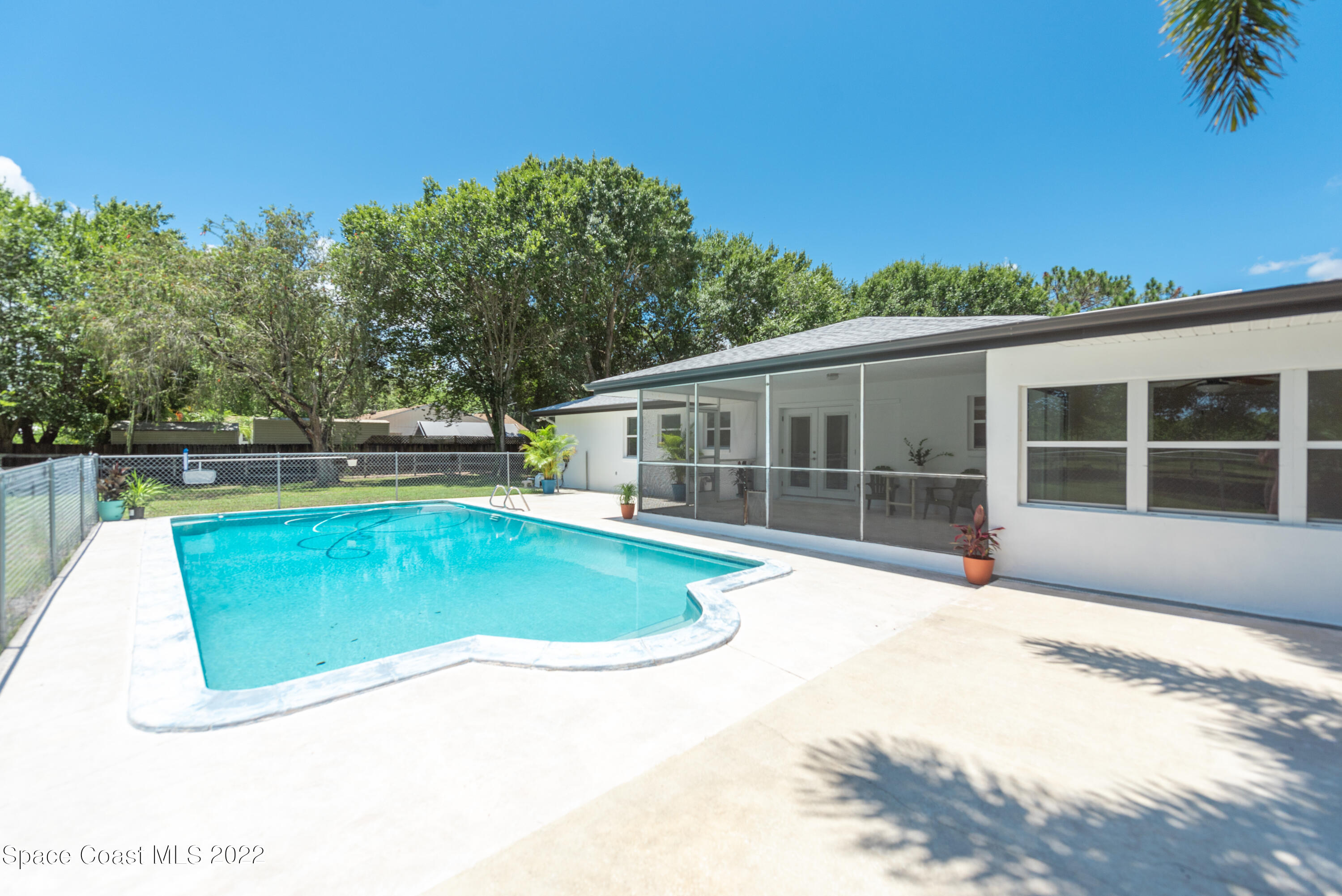 2085 Harlock Road Melbourne, FL 32934 - Photo 15 of 27 a view of a house with a swimming pool