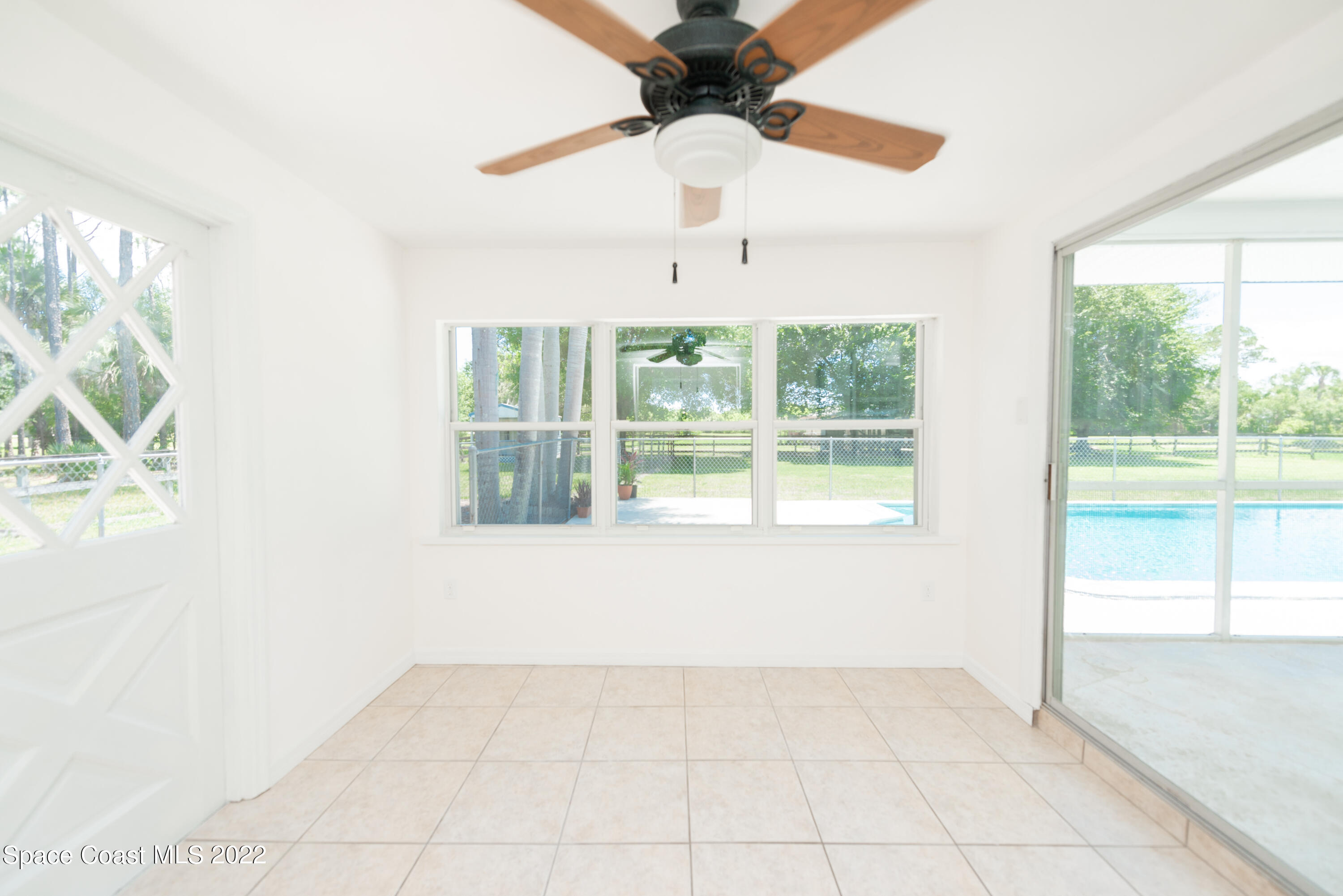 2085 Harlock Road Melbourne, FL 32934 - Photo 7 of 27 a view of an empty room with a window