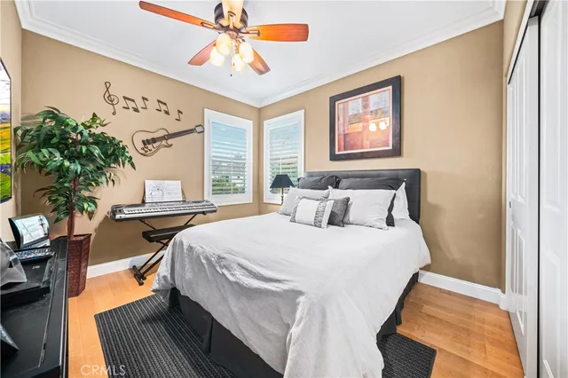 a bed room with a bed and a chandelier