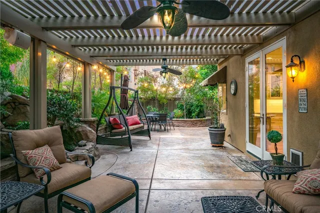 a view of living room with furniture and floor to ceiling window