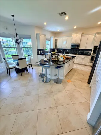 $6,900 | 8630 Lakeside Bend, Parkland, FL 33076