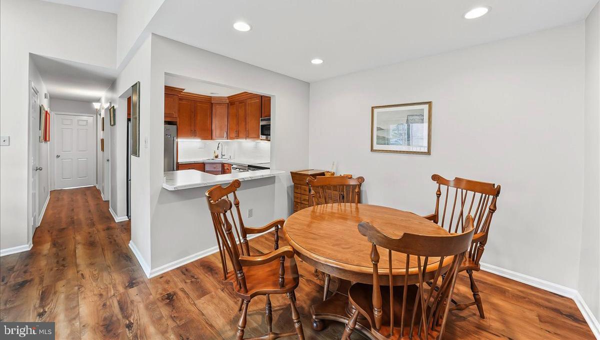 76 Le Forge Court, Unit 76 Chesterbrook, PA 19087 - Photo 12 of 34 Dining room opens to kitchen