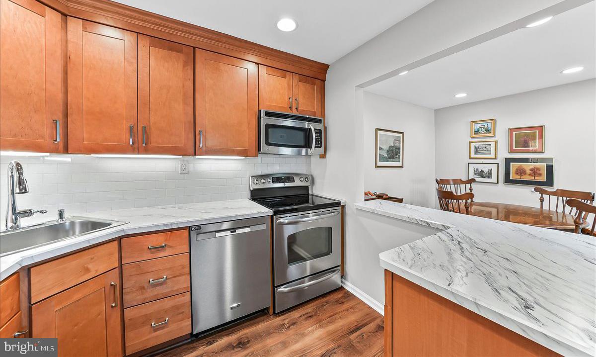 76 Le Forge Court, Unit 76 Chesterbrook, PA 19087 - Photo 16 of 34 Lots of cabinetry and counter top work space.