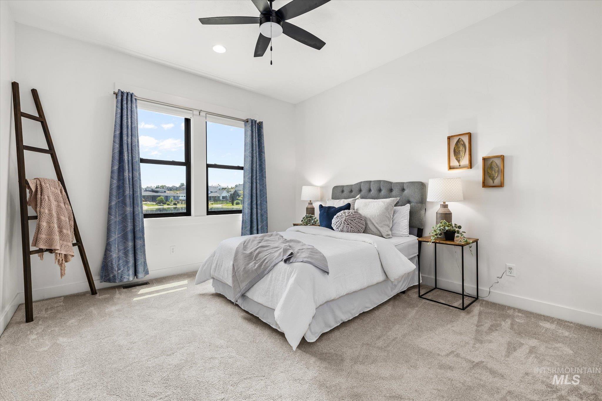 2248 South Trout Stone Way Eagle, ID 83616 - Photo 23 of 50 Bedroom featuring carpet flooring, a ceiling fan, and recessed lighting