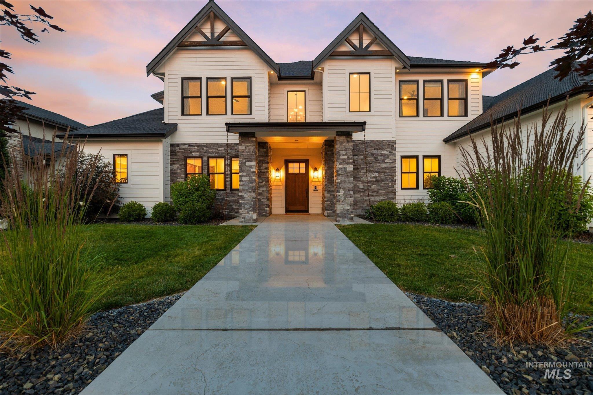 2248 South Trout Stone Way Eagle, ID 83616 - Photo 45 of 50 View of front of property with a yard and stone siding