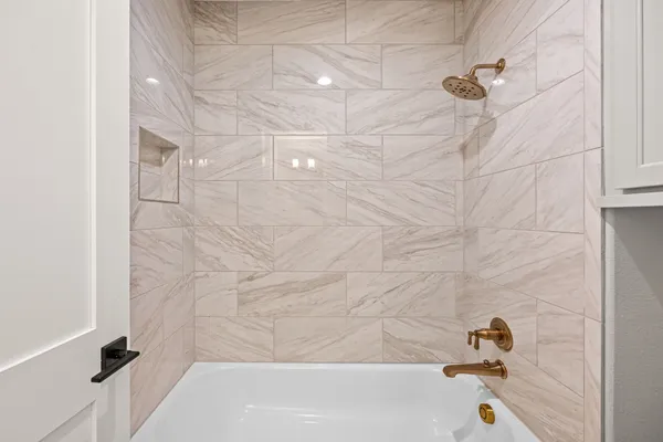 a bathroom with a bathtub