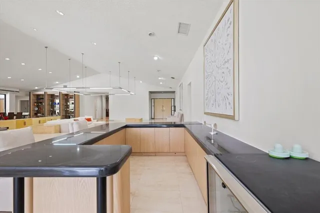 a room with lots of furniture and a table