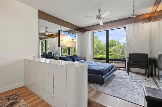 a table with wine bottles and glasses on it