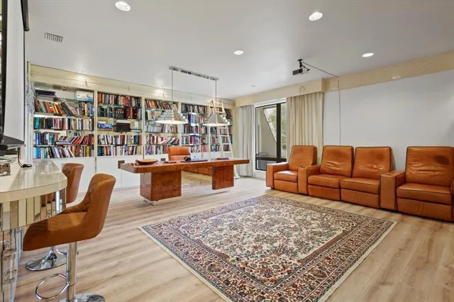 a bathroom with a tub and shower