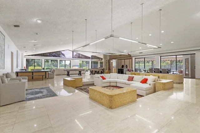 a living room with furniture and a table