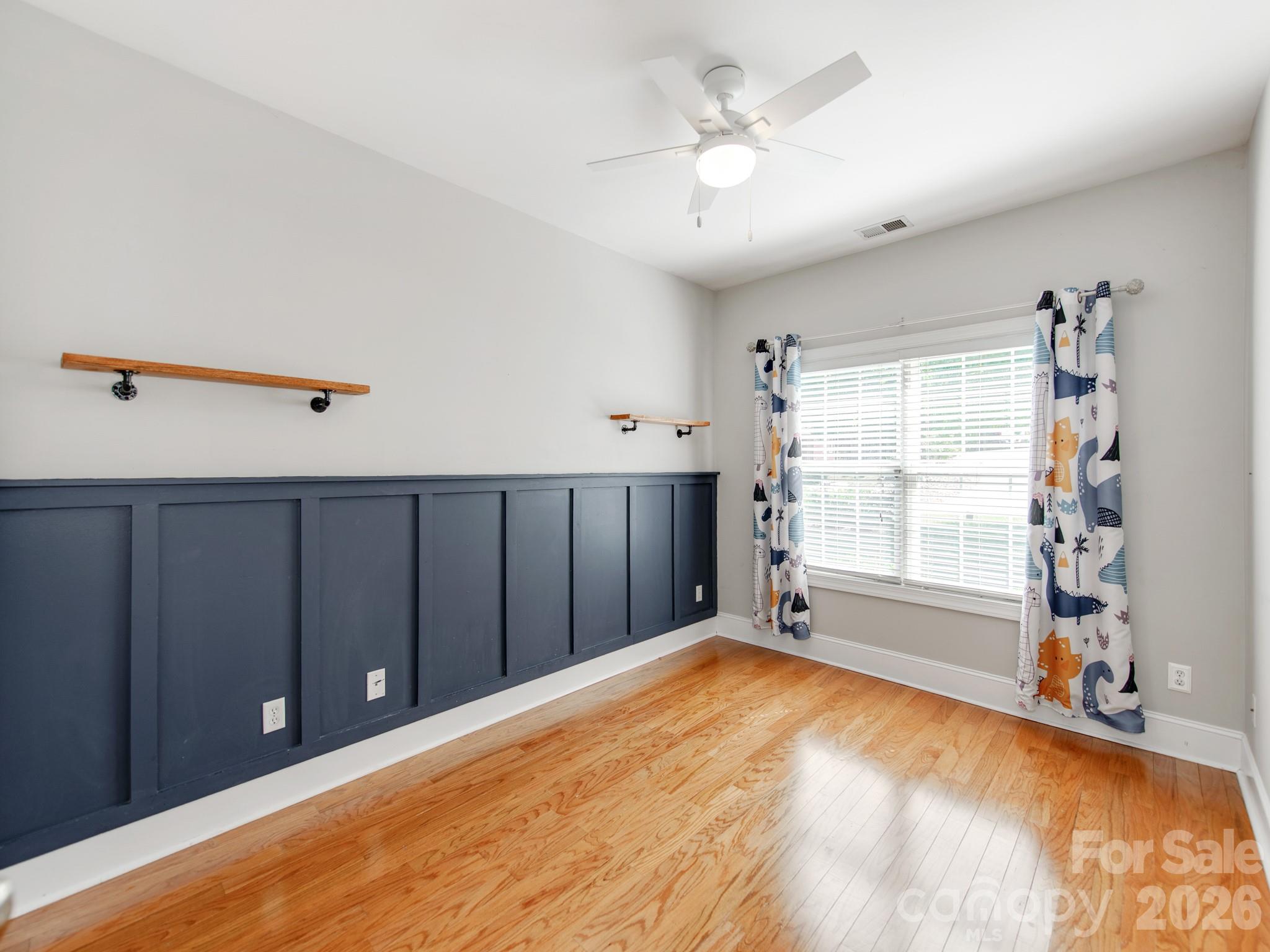 783 Sloan Street Denver, NC 28037 - Photo 26 of 44 a view of an empty room with a window