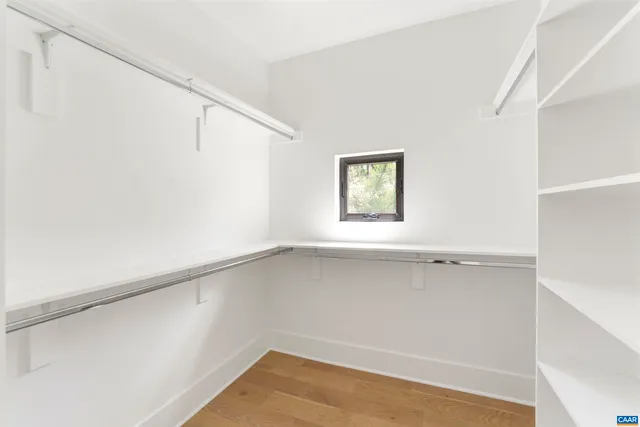 a view of a room that has a window